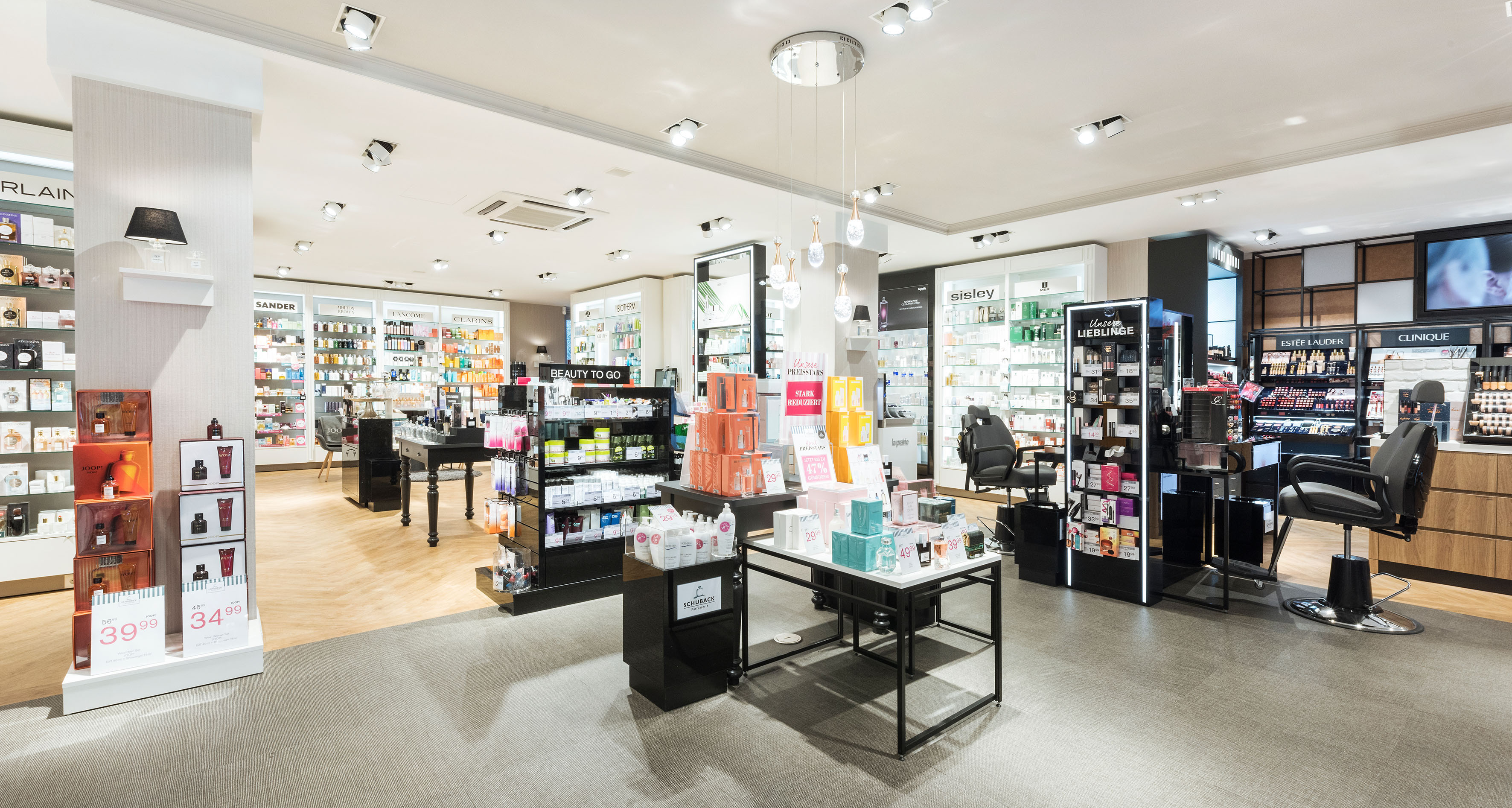 Parfümerie Schuback Nette+Hartmann Hamburg Alsterchaussee Retail Shop Konzept frisches Design Kosmetik